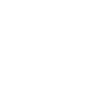 Two workers from Kokua Tree Care are trimming a large tree. One stands on the ground holding a rope, while the other operates a lift to reach the upper branches, showcasing expert tree care Maui residents trust.